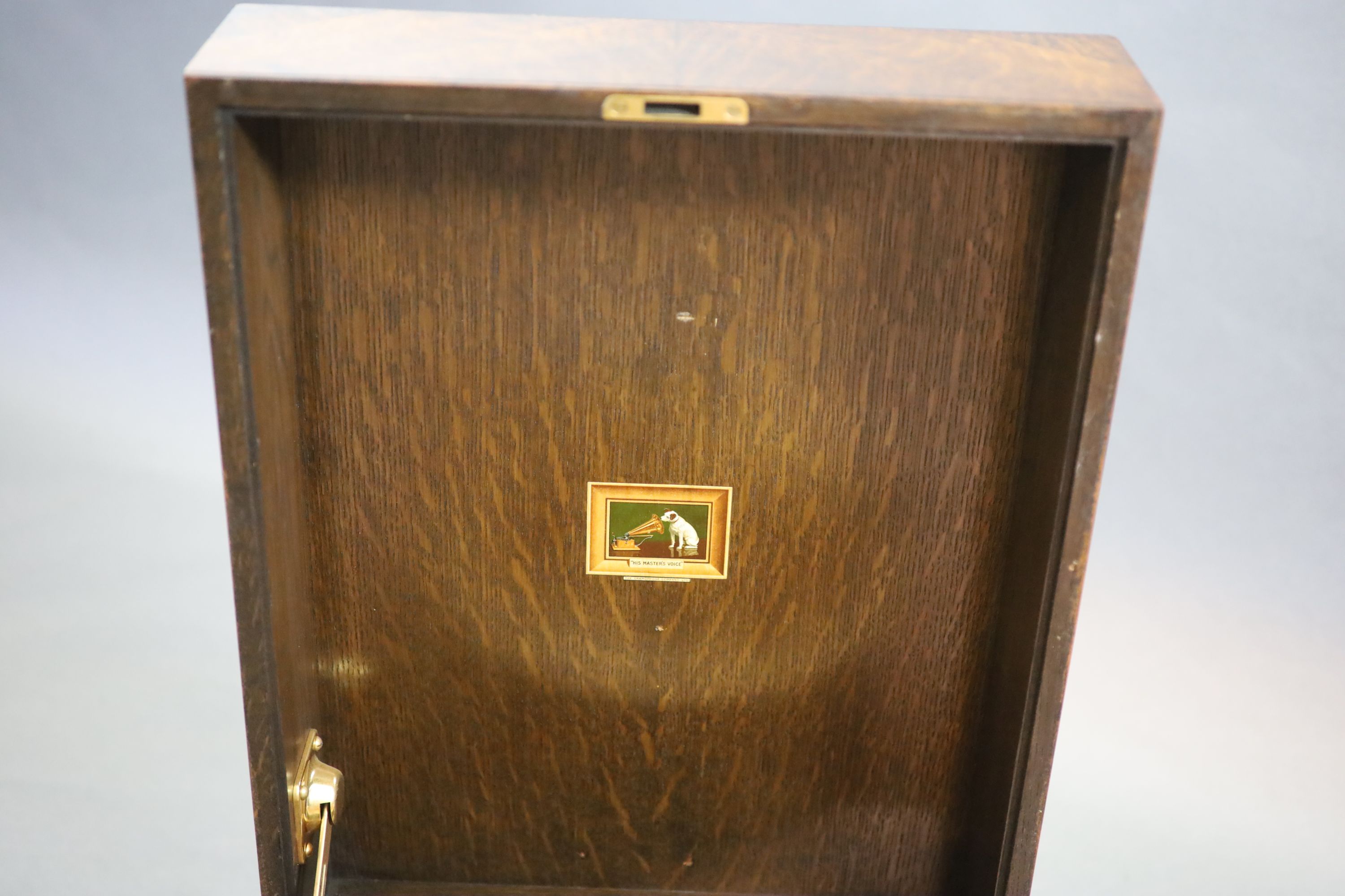 A HMV Lumiere model oak cased 460 gramophone, c1925, closed measurements 42cm wide, 55cm deep, 27cm high.